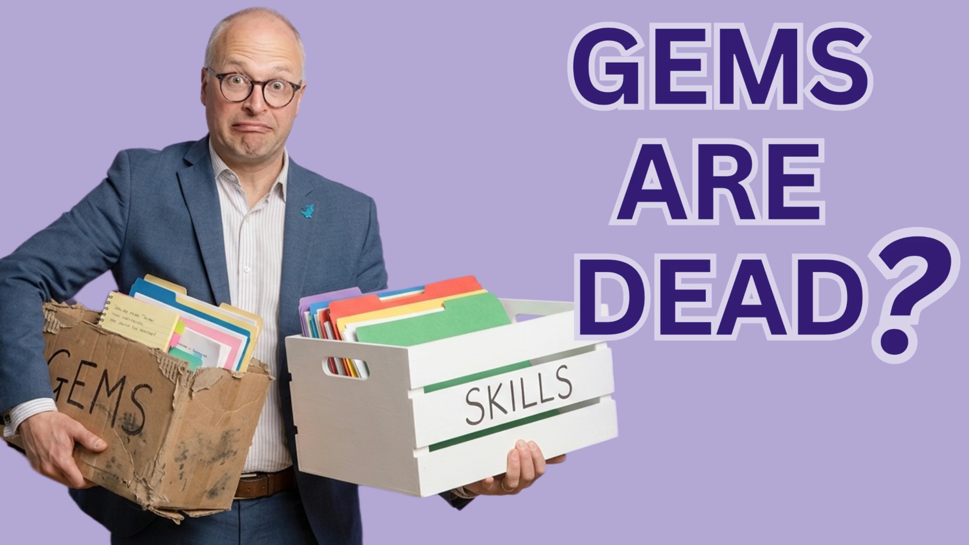 Stephen Wiles holding a old and dusty box labelled 'Gems' in one hand. In the other, a fresh box called 'Skills'.